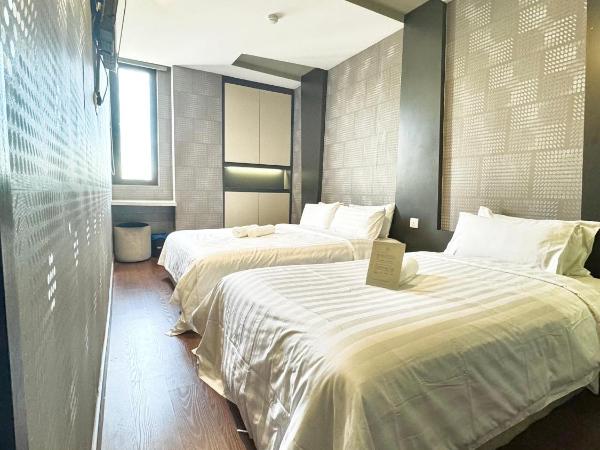 Chariton Hotel Nusa Bestari : photo 2 de la chambre chambre familiale deluxe