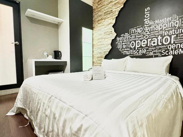 Chariton Hotel Nusa Bestari : photo 1 de la chambre chambre standard lit queen-size