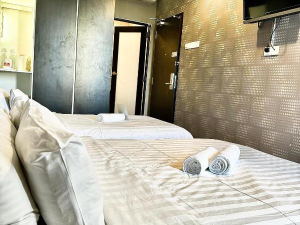 Chariton Hotel Nusa Bestari : photo 1 de la chambre chambre familiale deluxe