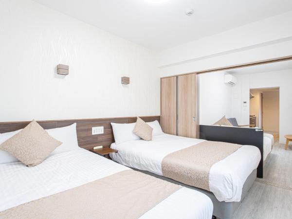 Dream Inn Hakata : photo 1 de la chambre 【annex】3 double beds room - non-smoking