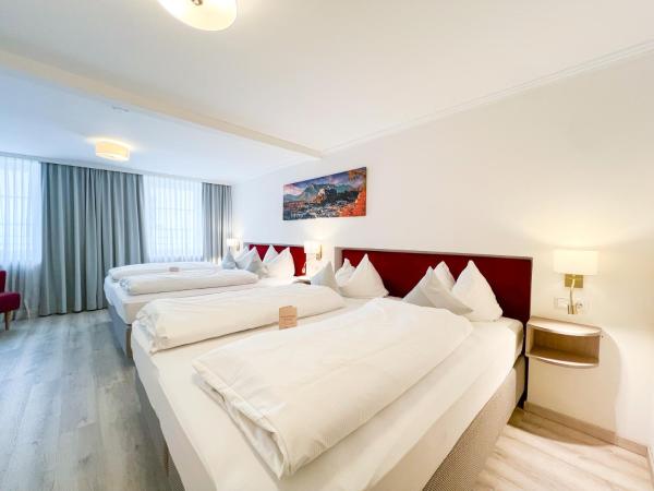 Cityhotel Trumer Stube : photo 2 de la chambre chambre quadruple