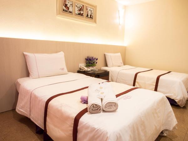 Lavender Inn Nusa Bestari : photo 2 de la chambre chambre lits jumeaux supérieure