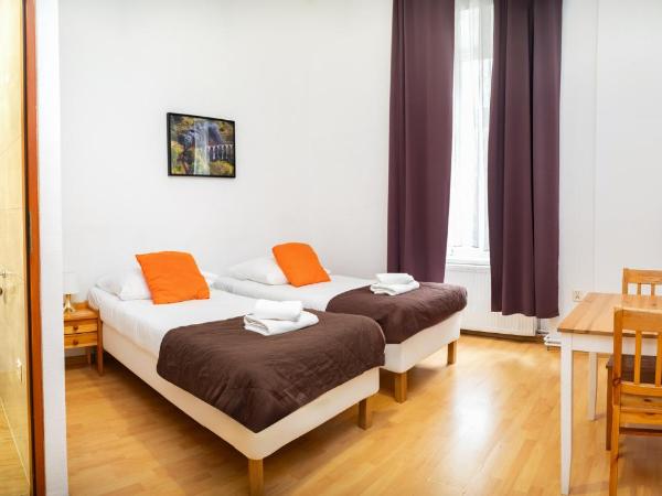 Station Aparthotel : photo 1 de la chambre chambre lits jumeaux