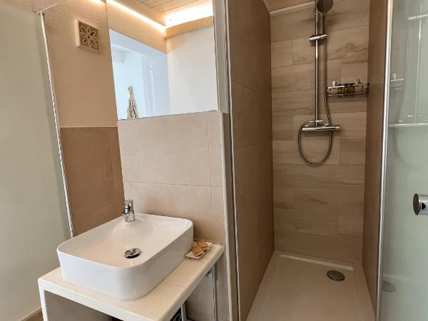 San Michele Luxury Rooms : photo 8 de la chambre chambre lit king-size avec baignoire spa