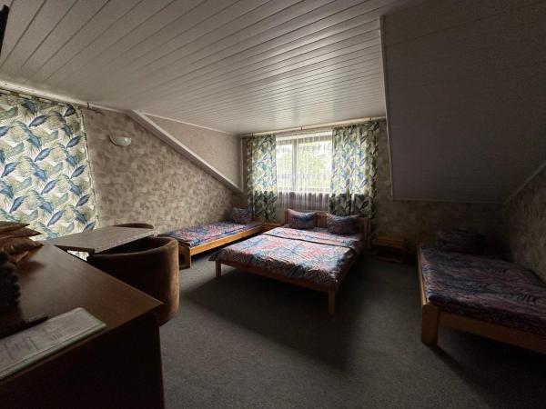 Guest House Villa Arkadia : photo 3 de la chambre chambre familiale avec salle de bains privative