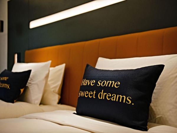 MUSTEL Hotel Guangzhou Nansha : photo 4 de la chambre chambre lits jumeaux exécutive