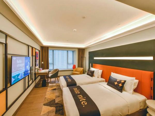 MUSTEL Hotel Guangzhou Nansha : photo 1 de la chambre chambre lits jumeaux exécutive
