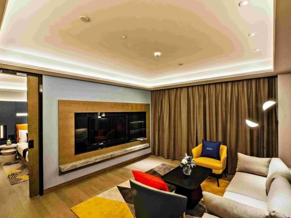 MUSTEL Hotel Guangzhou Nansha : photo 4 de la chambre suite supérieure lit king-size