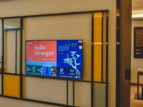 MUSTEL Hotel Guangzhou Nansha : photo 2 de la chambre suite supérieure lit king-size