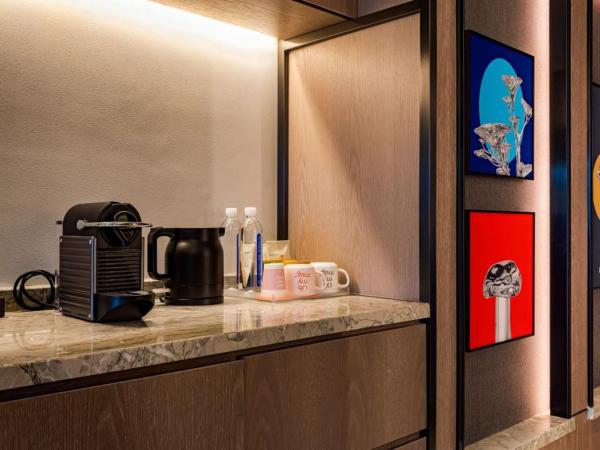 MUSTEL Hotel Guangzhou Nansha : photo 6 de la chambre suite supérieure lit king-size