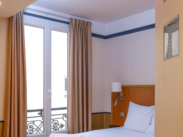 Hôtel Marignan : photo 1 de la chambre chambre simple avec douche et toilettes