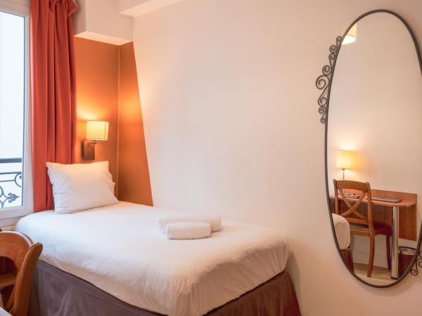 Hôtel Marignan : photo 1 de la chambre chambre simple (douche et toilettes communes au même Étage)