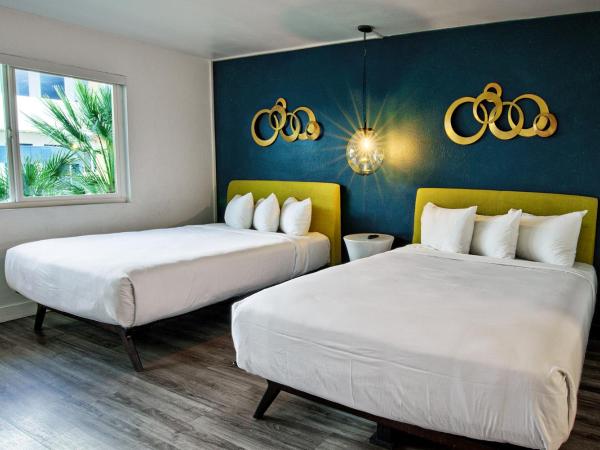 Downtowner Boutique Hotel : photo 4 de la chambre hébergement double lit queen-size fairway