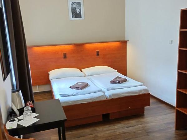 Beta Pension : photo 3 de la chambre chambre lits jumeaux