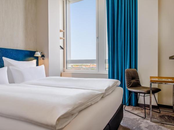 Motel One München-Campus : photo 3 de la chambre chambre lit queen-size 