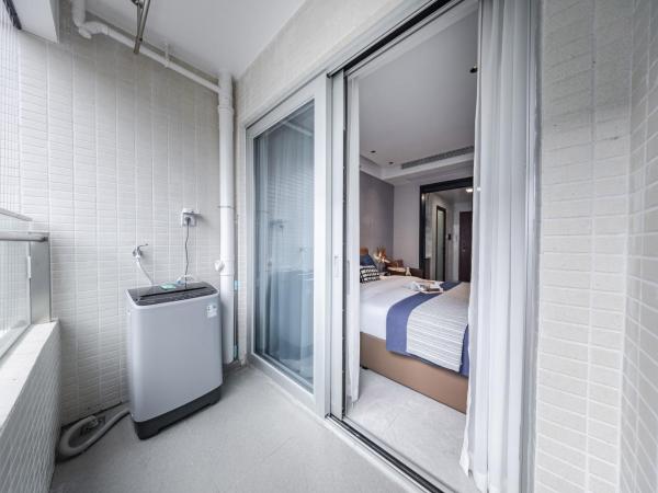 岗厦雅乐行政公寓- Shenzhen Convention and Exhibition Center : photo 3 de la chambre chambre supérieure lit queen-size