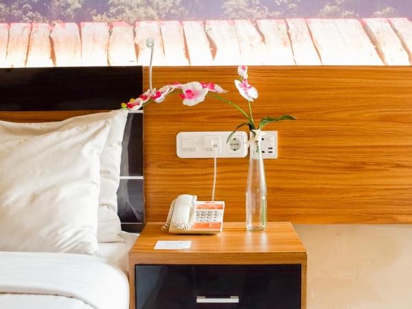 Pandanaran Prawirotaman Yogyakarta : photo 6 de la chambre chambre deluxe double ou lits jumeaux