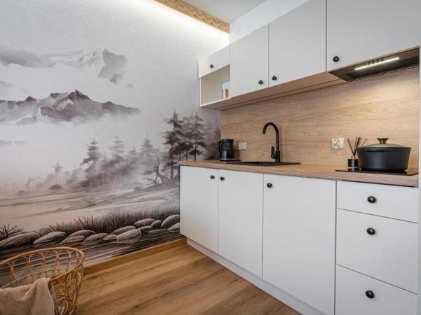 Pensjonat Dawidek : photo 9 de la chambre appartement avec balcon