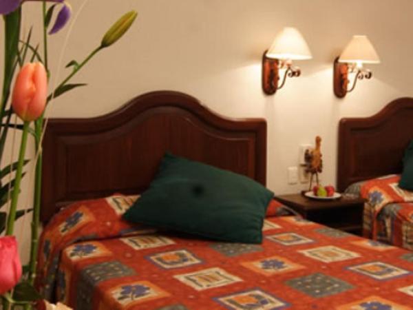 Hotel Antiguo Fortin : photo 1 de la chambre chambre avec 2 grands lits queen-size