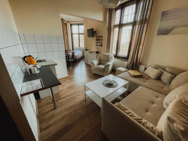 Central Sopot : photo 1 de la chambre studio lit king-size avec canapé-lit