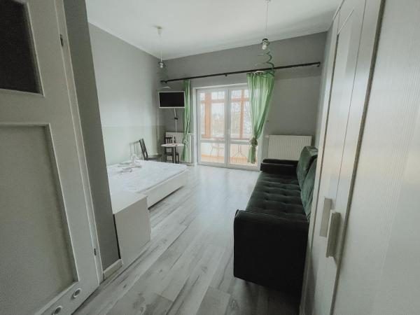 Central Sopot : photo 1 de la chambre chambre lit queen-size avec balcon