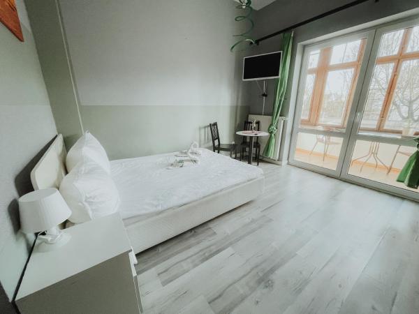 Central Sopot : photo 3 de la chambre chambre lit queen-size avec balcon