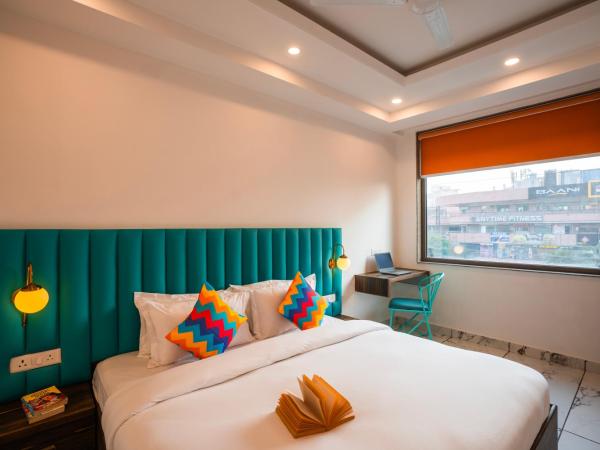 goSTOPS Gurugram : photo 3 de la chambre chambre double avec salle de bains privative