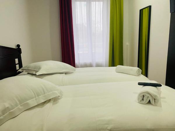 Enzo Hotels Limoges Centre Jourdan by Kyriad Direct : photo 5 de la chambre chambre standard - 2 lits simples
