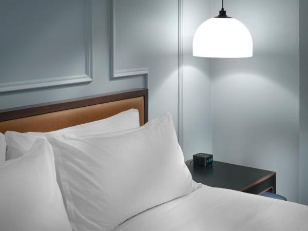 Axiom Hotel : photo 2 de la chambre chambre lit queen-size premium avec 2 lits queen-size