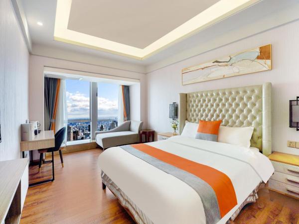 HT Legend Hotel Changgang Metro Station Exit F - Free Shuttle Bus to Canton Fair Complex During Canton Fair Period : photo 1 de la chambre chambre double deluxe