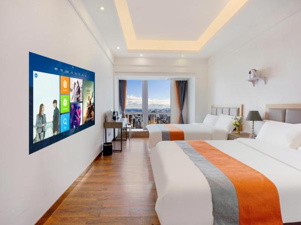 HT Legend Hotel Changgang Metro Station Exit F - Free Shuttle Bus to Canton Fair Complex During Canton Fair Period : photo 1 de la chambre chambre lits jumeaux avec douche 