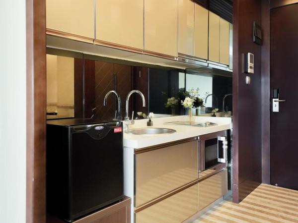 HT Legend Hotel Changgang Metro Station Exit F - Free Shuttle Bus to Canton Fair Complex During Canton Fair Period : photo 10 de la chambre chambre lits jumeaux exécutive