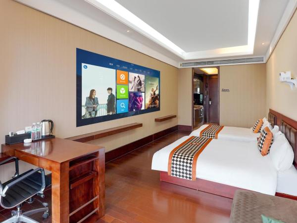 HT Legend Hotel Changgang Metro Station Exit F - Free Shuttle Bus to Canton Fair Complex During Canton Fair Period : photo 9 de la chambre chambre lits jumeaux exécutive