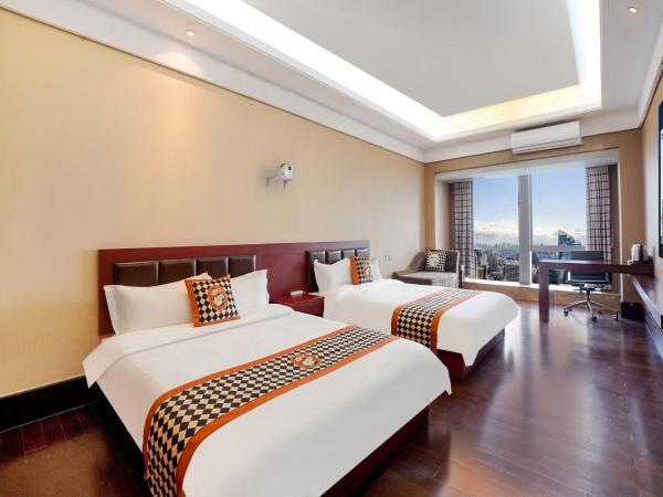 HT Legend Hotel Changgang Metro Station Exit F - Free Shuttle Bus to Canton Fair Complex During Canton Fair Period : photo 3 de la chambre chambre lits jumeaux exécutive