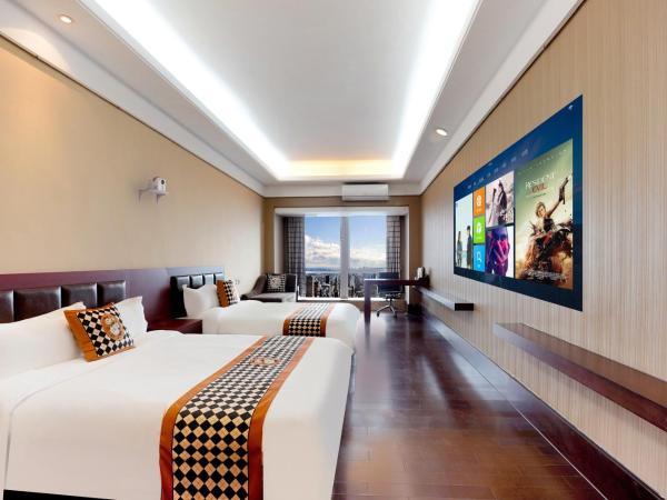 HT Legend Hotel Changgang Metro Station Exit F - Free Shuttle Bus to Canton Fair Complex During Canton Fair Period : photo 1 de la chambre chambre lits jumeaux exécutive