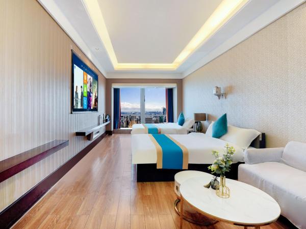 HT Legend Hotel Changgang Metro Station Exit F - Free Shuttle Bus to Canton Fair Complex During Canton Fair Period : photo 2 de la chambre chambre lits jumeaux exécutive