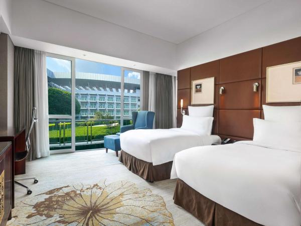 Pullman Guangzhou Baiyun Airport : photo 1 de la chambre chambre lits jumeaux supérieure avec vue sur cour