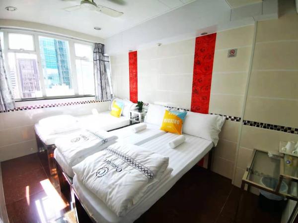 New Peking Guest House : photo 4 de la chambre chambre triple