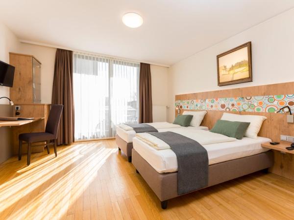 Hotel Heffterhof : photo 1 de la chambre chambre double ou lits jumeaux confort avec balcon