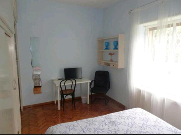 B&B Rivalta - Posillipo : photo 3 de la chambre chambre double ou lits jumeaux - vue sur jardin