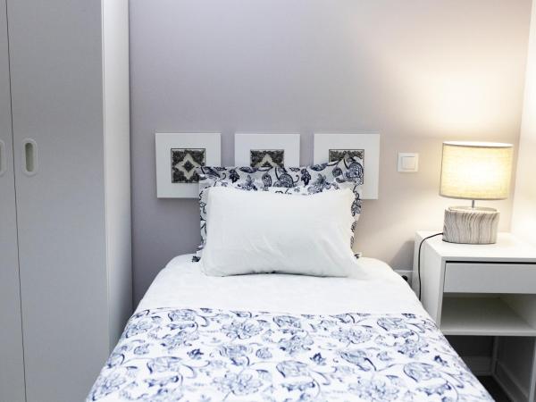 Guest House Triunfo : photo 4 de la chambre chambre simple donnant sur l’intérieur