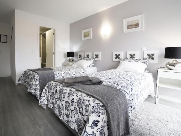 Guest House Triunfo : photo 5 de la chambre chambre lits jumeaux