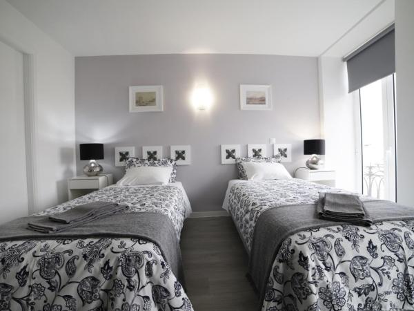 Guest House Triunfo : photo 6 de la chambre chambre lits jumeaux