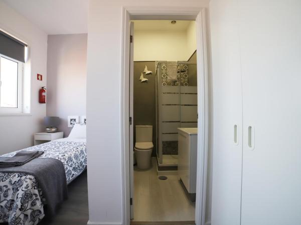 Guest House Triunfo : photo 1 de la chambre chambre lits jumeaux