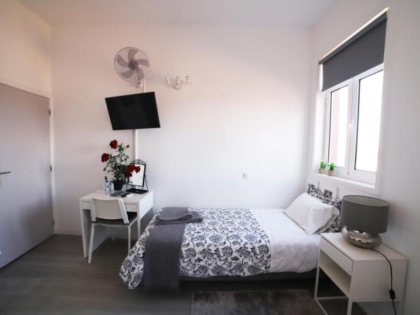 Guest House Triunfo : photo 2 de la chambre chambre lits jumeaux