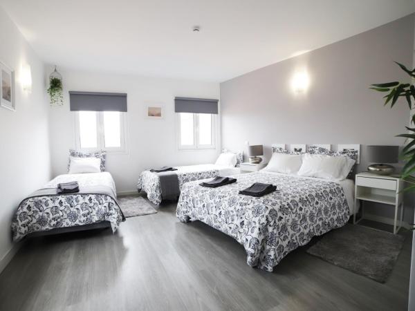 Guest House Triunfo : photo 8 de la chambre chambre quadruple classique