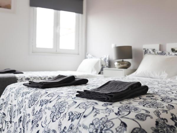 Guest House Triunfo : photo 6 de la chambre chambre quadruple classique