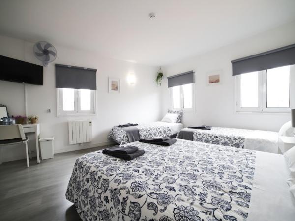 Guest House Triunfo : photo 2 de la chambre chambre quadruple classique