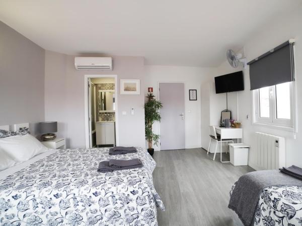 Guest House Triunfo : photo 4 de la chambre chambre quadruple classique