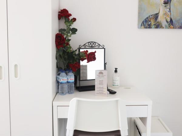 Guest House Triunfo : photo 10 de la chambre chambre familiale (4 adultes)